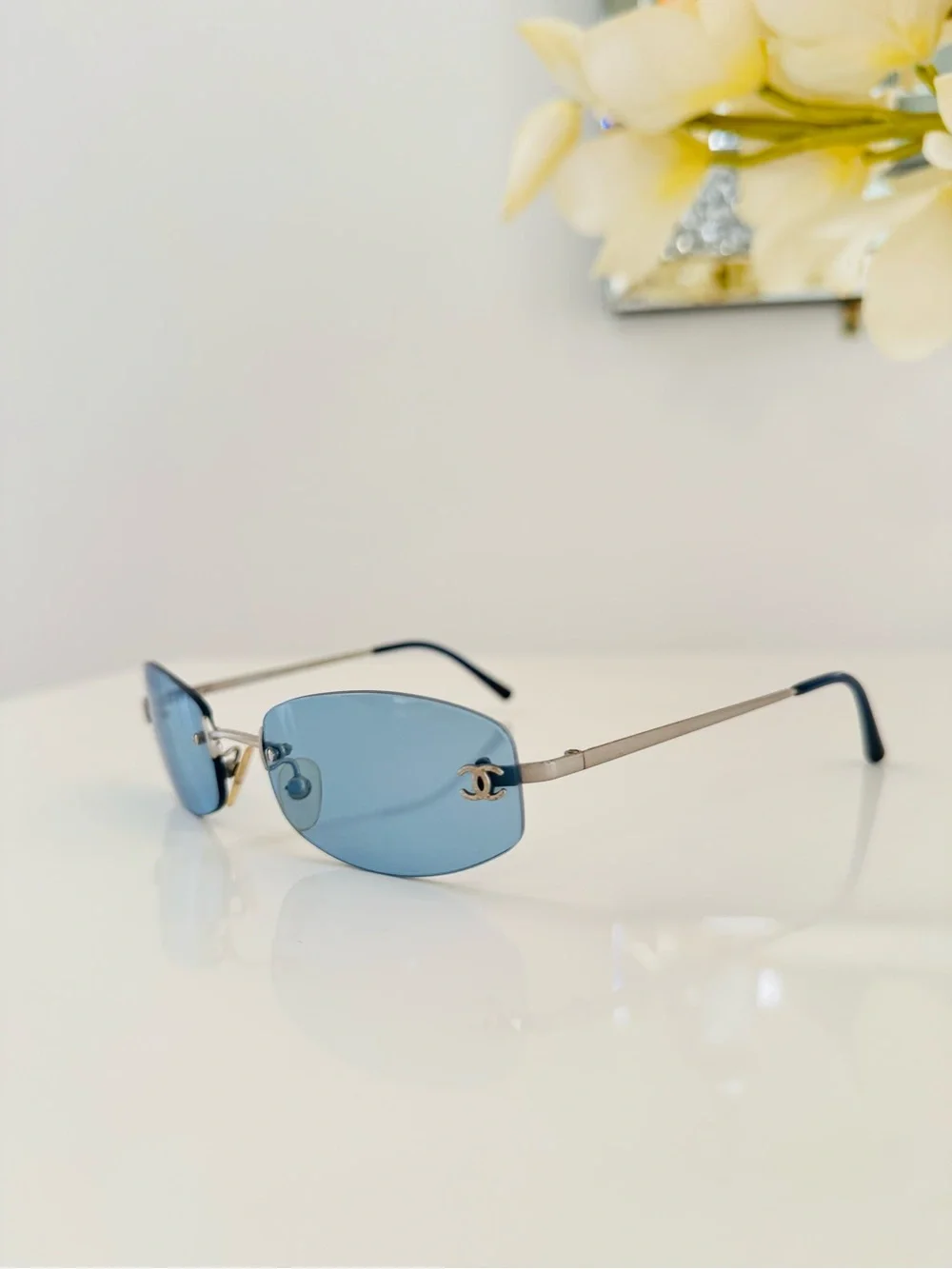 RARE 💫 vintage Chanel blue rimless sunglasses.